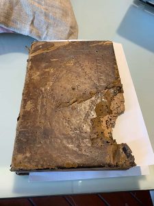 The damaged wooden board and leather cover of a late-15th century Missal manuscript our students had access to
